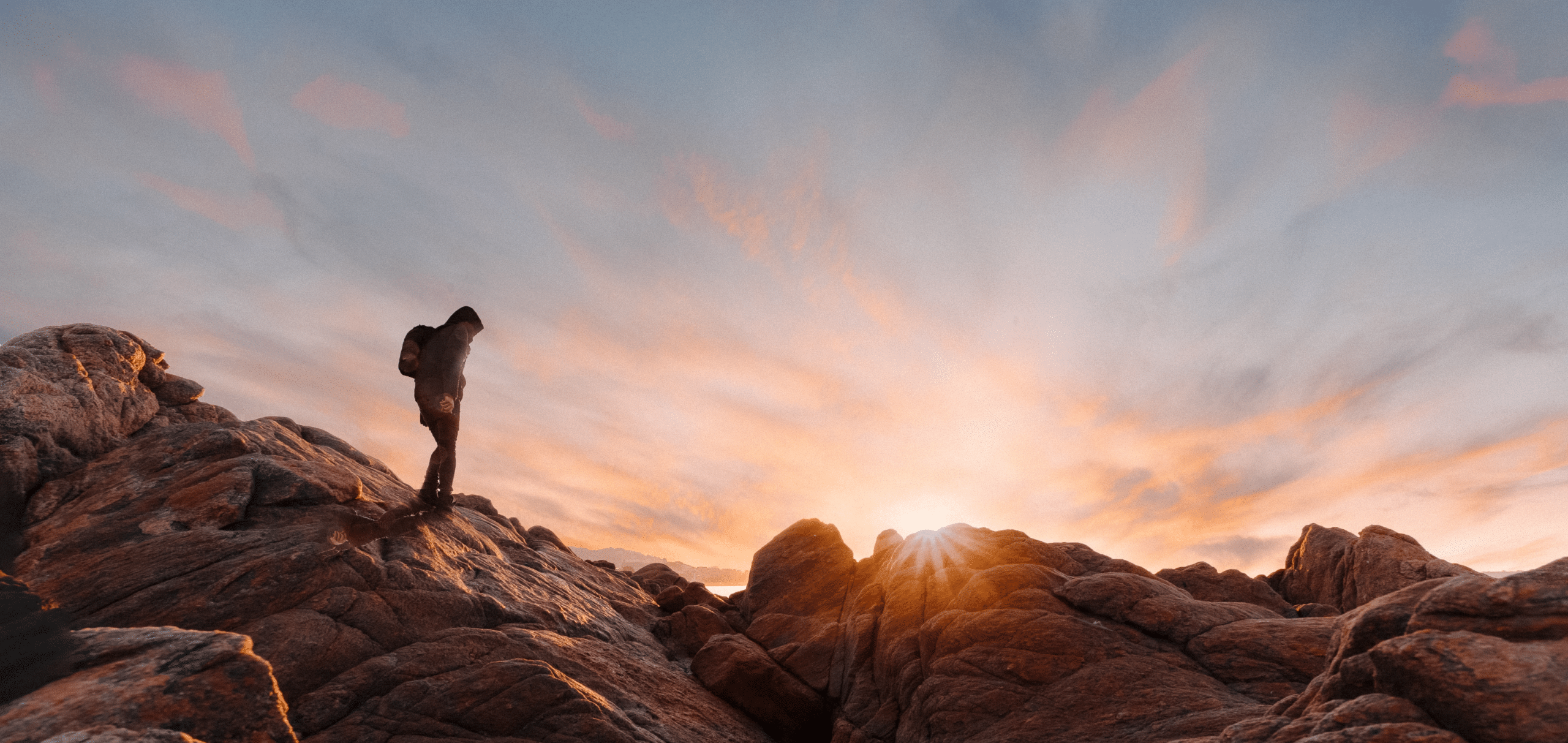 Man hiking in sundown